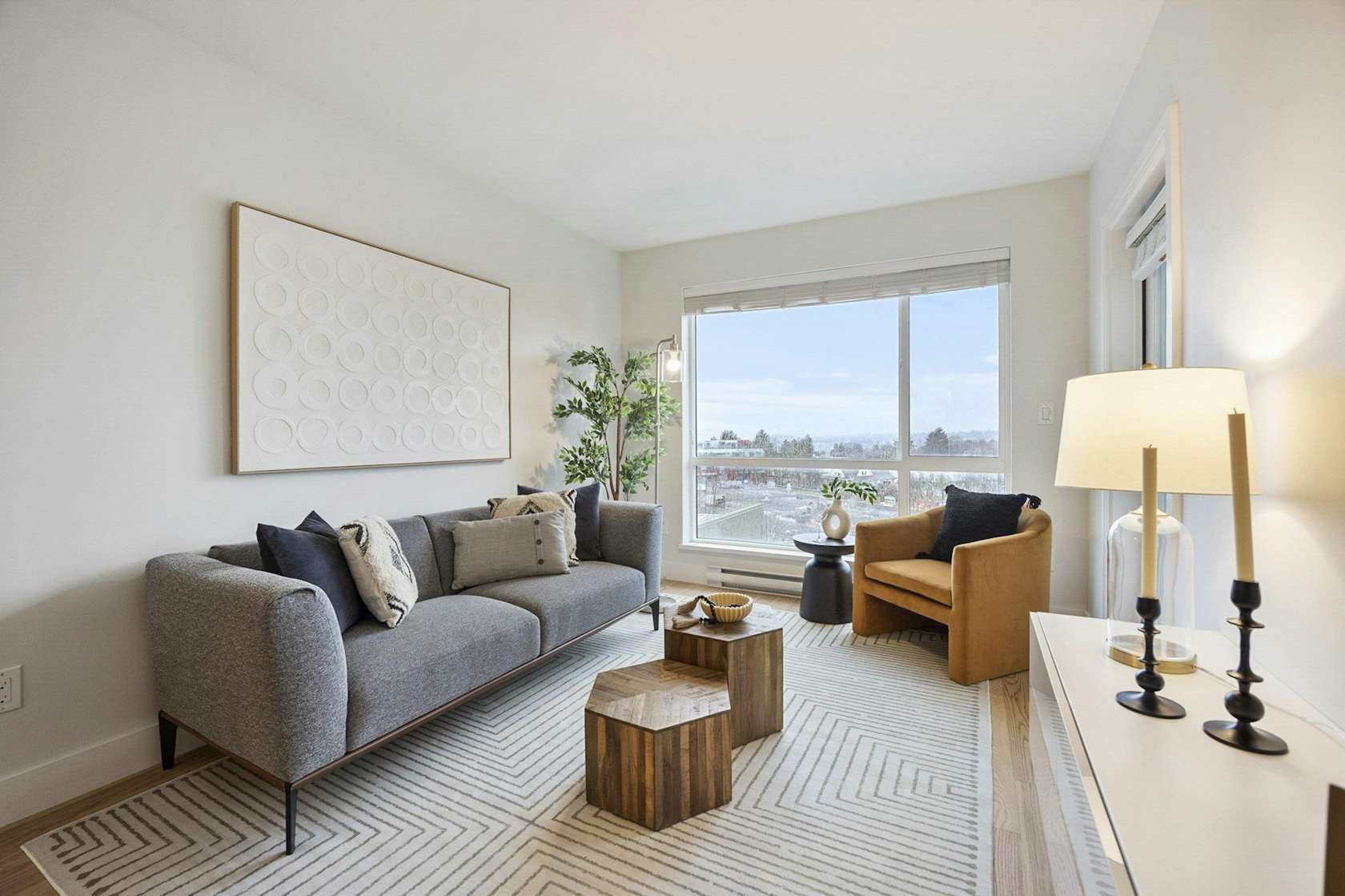 Professionally staged Vancouver condo living room with city view